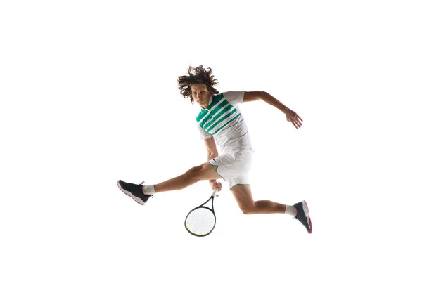 Young caucasian professional sportsman playing tennis isolated on white background — Stock Photo, Image