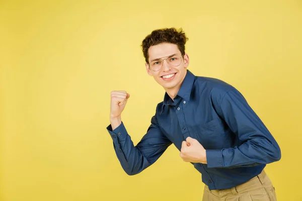 Caucasian mans portrait isolated on yellow studio background with copyspace — Stock Photo, Image