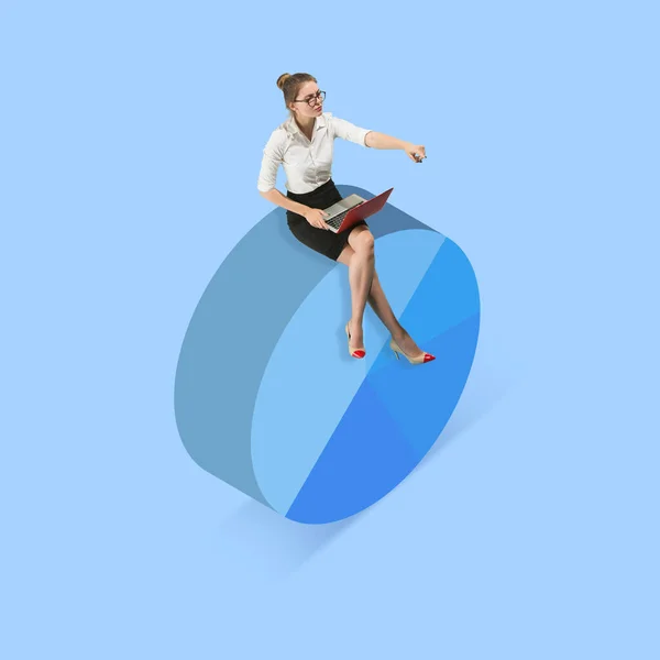 Young girl, accountant, finance analyst or clerk in office suit isolated on blue background. — Stock fotografie