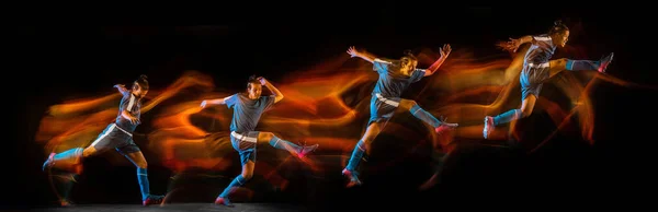 Development of motions. Young man, football player in action isolated over dark background in neon mixed colored light. Flyer. — стоковое фото