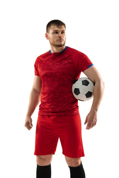 Professionele Kaukasische voetbal voetballer geïsoleerd op witte studio achtergrond. — Stockfoto