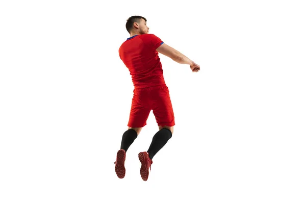 Poderoso, volando sobre el campo. Fútbol joven, jugador de fútbol en acción, movimiento aislado sobre fondo blanco . — Foto de Stock