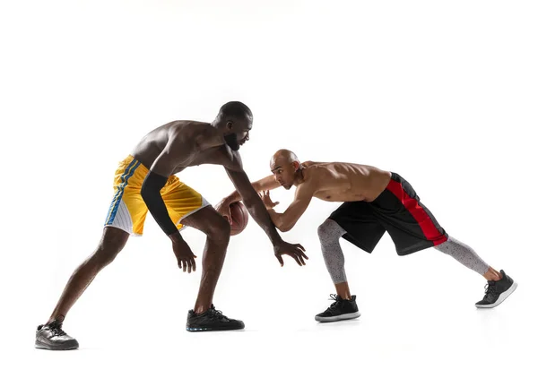 Two men basketball players competition in silhouette isolated white background — Stock Photo, Image