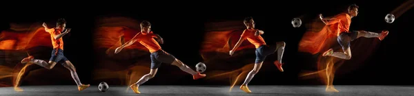 Спортсмены играют в футбол на черном фоне в смешанном свете. Кавказцы подходят молодым игрокам в движении или действии — стоковое фото