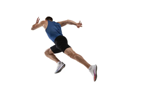 Caucasian professional male athlete, runner training isolated on white studio background. Muscular, sportive man. Concept of action, motion, youth, healthy lifestyle. Copyspace for ad. — Stock Photo, Image