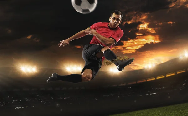 Male football or soccer player at stadium - motion, action, activity concept — Stock Photo, Image