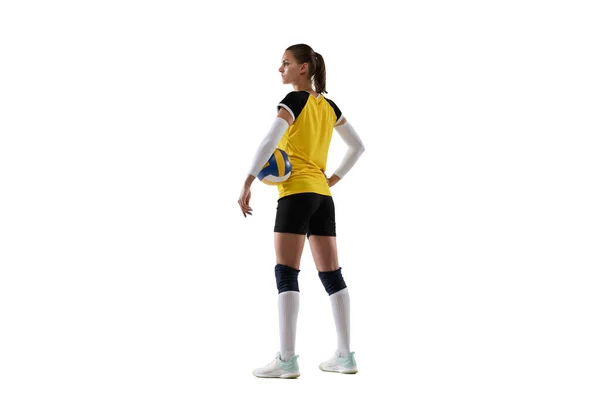 Young female volleyball player isolated on white studio background. Woman in sports equipment and shoes or sneakers training and practicing. — Stock Photo, Image