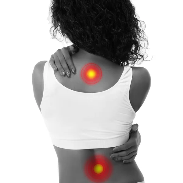 背中の背骨に痛みを示す女性の体。医学的概念。マッサージ、健康的なライフスタイルの概念. — ストック写真