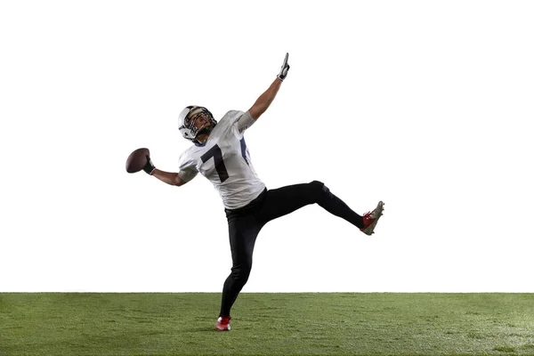 American football player isolated on white studio background. — Stock fotografie