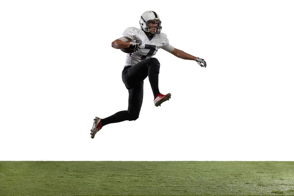 American football player in action isolated on white studio background. Concept of professional sport, championship, competition. — Stock Photo, Image