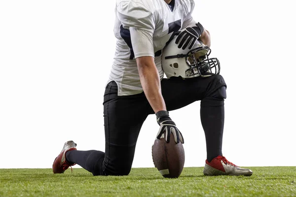 Cropped image of male American football player, athlete posing isolated on white studio background. Concept of professional sport, championship, competition. — стоковое фото