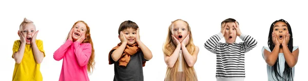 Collage fatto di ritratti di bambini piccoli carini, ragazzi e ragazze isolati su sfondo bianco studio. Emozioni umane, espressione facciale, concetto di infanzia — Foto Stock
