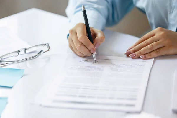 Close up of female hands signing business contract. Concept of female business, online education, professional occupation — ストック写真