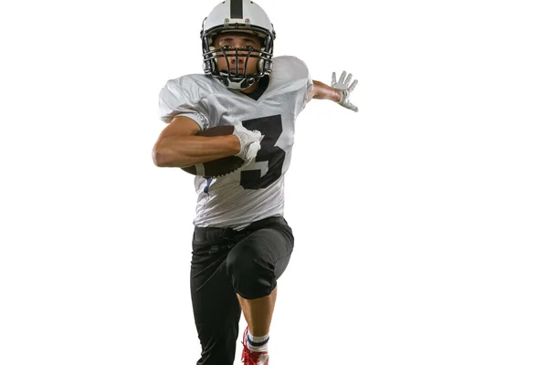 Close-up portrait of American football player in sports equipment, helmet and gloves isolated on white studio background. Concept of sport, competition — Stock Photo, Image