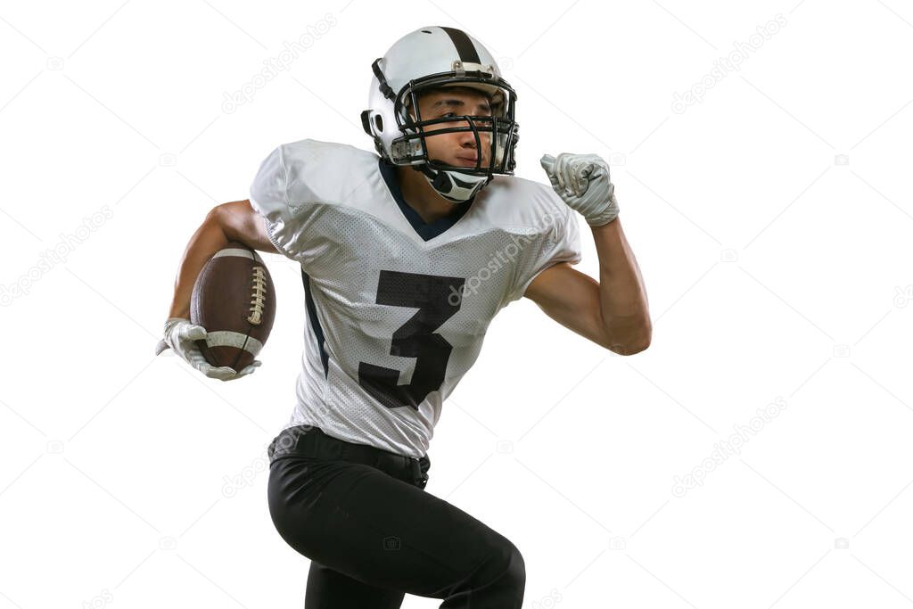 Close-up portrait of American football player in sports equipment, helmet and gloves isolated on white studio background. Concept of sport, competition