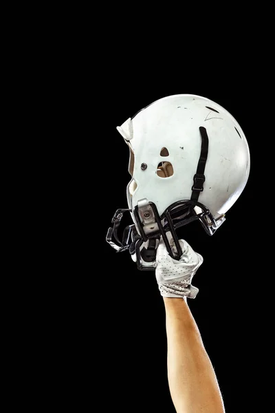 Equipment for american football. Human hand holding white helmet isolated on dark studio background. Concept of sport, competition, goals, achievments — Stock Photo, Image