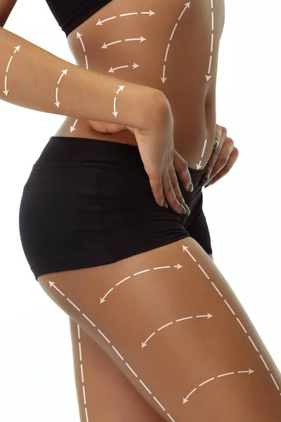 Detailní záběr krásné ženské tělo s zvedání šípy izolované na bílém pozadí — Stock fotografie