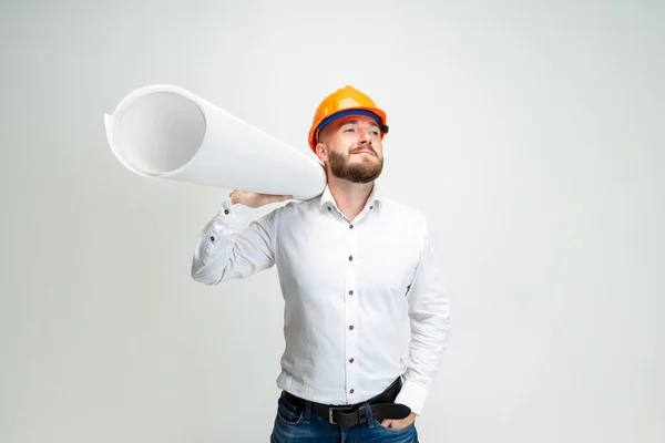High angle view of funny bearded man, builder, designer or architect with professional equipment isolated on white studio background. — Stock Photo, Image