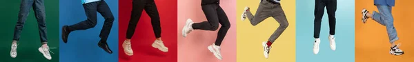 Колаж з жіночими і чоловічими ногами в кольорових кросівок, тренерів бігають, стрибають ізольовано на яскравому різнокольоровому фоні . — стокове фото