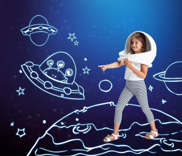 Contemporary artwork with little girl in huge white astronaut helmet standing among drawn planets, asteroids and stars in outer space. Ideas, inspiration, imagination. Collage