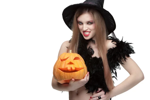 Lány a Halloween tök fehér háttér — Stock Fotó