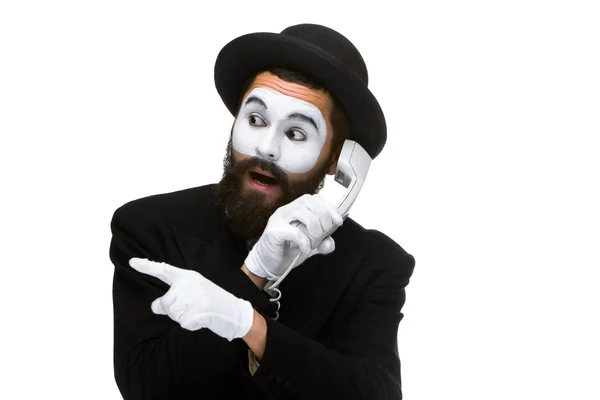 Man in de afbeelding mime houden een handset. — Stockfoto