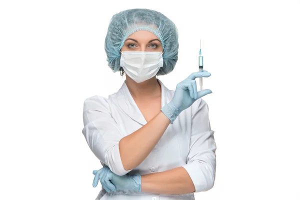 Porträtt av lady kirurg visar spruta över vit bakgrund — Stockfoto