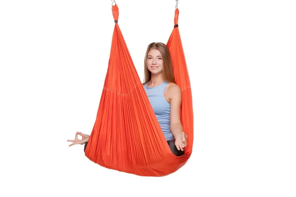 Young woman doing anti-gravity aerial yoga — Stock Photo, Image