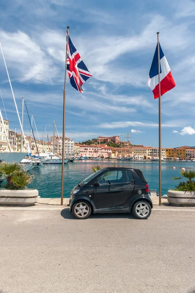Small car on the waterfront of Porto Azzurro, Italy — Stock Photo, Image