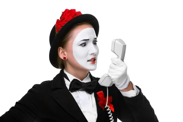 Woman in the image mime holding a handset. — Stock Photo, Image