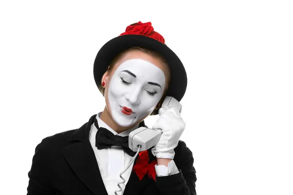 Vrouw in de afbeelding mime houden een handset. — Stockfoto