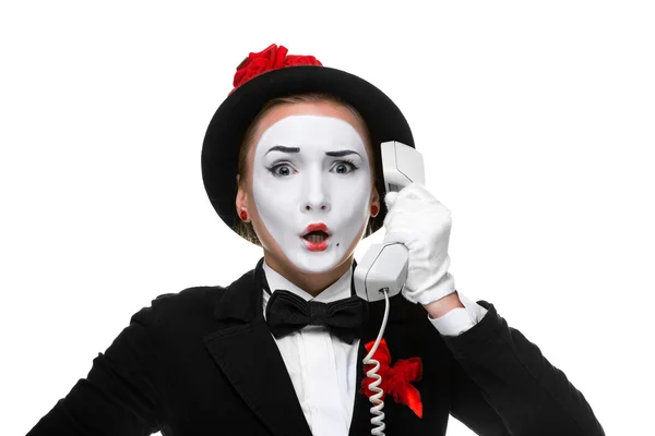 Vrouw in de afbeelding mime houden een handset. — Stockfoto