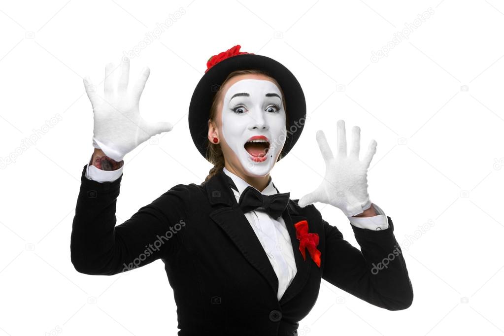 Portrait of the surprised and joyful mime with open mouth