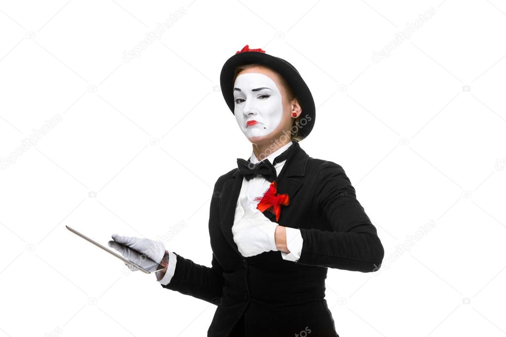 business woman in the image mime holding tablet PC