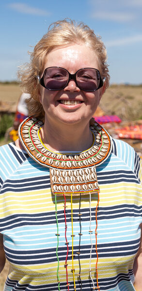 Portrait of woman wearing traditional handmade accessories, Kenya