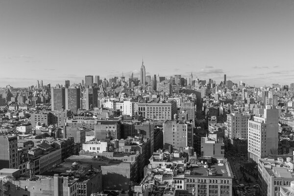USA, NEW YORK CITY - April 27, 2012: New York City Manhattan skyline aerial view with street and skyscrapers. colorless photo