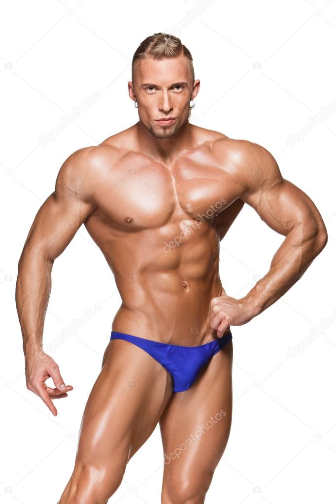 Attractive male body builder on white background