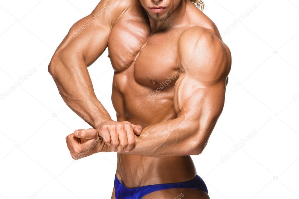 Attractive male body builder on white background