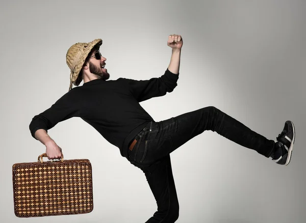 Young, attractive man  in sunglasses with  suitcase ready to travel — Stock Photo, Image