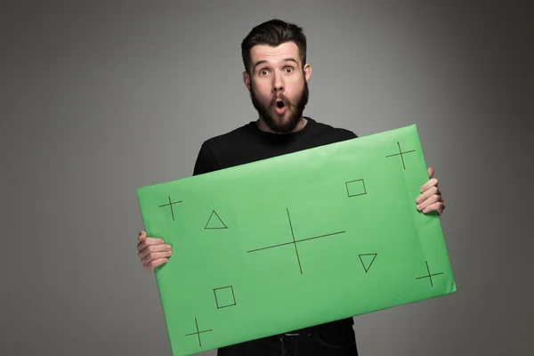 The surprised man as businessman with green panel — Stock Photo, Image