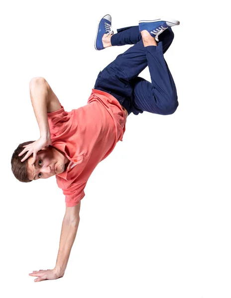 Dançarino de quebra fazendo um suporte de mão contra um fundo branco — Fotografia de Stock