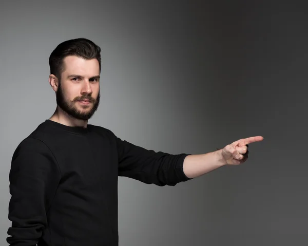 The man pointing a great idea - over gray background — Stock Photo, Image