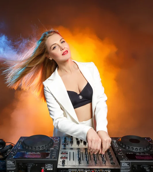 Beautiful blonde DJ girl on decks - the party, — Stock Photo, Image