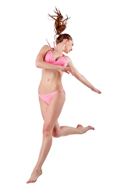 Beautiful young woman in pink swimwear — Stock Photo, Image