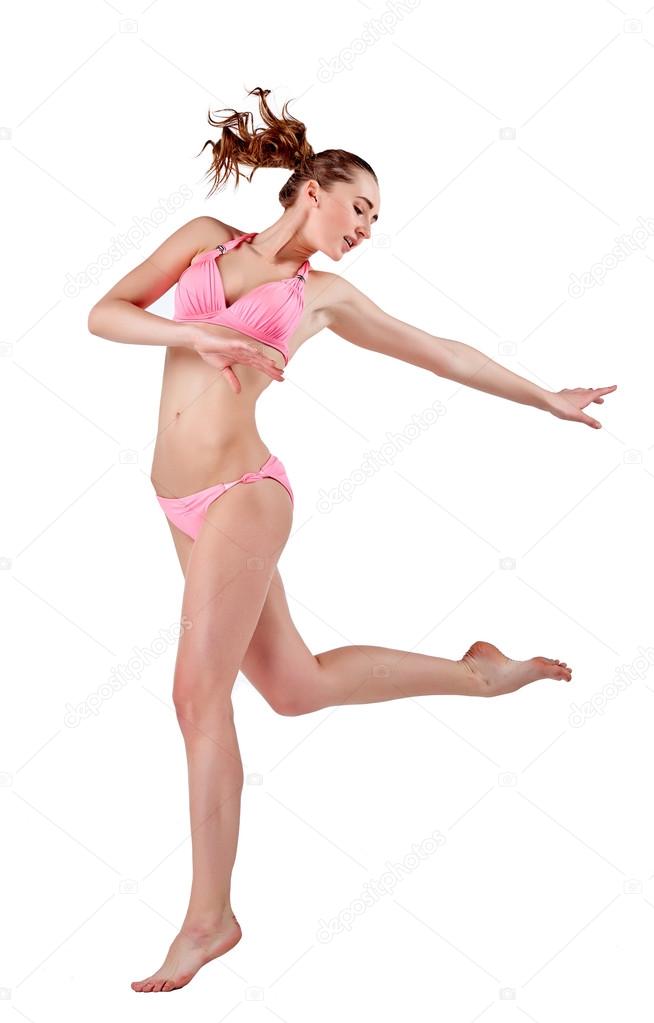 Beautiful young woman in pink swimwear
