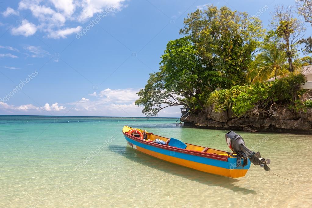 Fish boat on the paradise beach of Jamaica