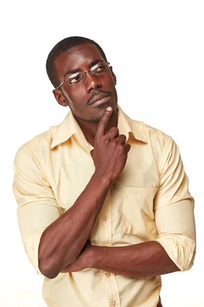 Young  black african man thinking and reminiscing about something — Stock Photo, Image