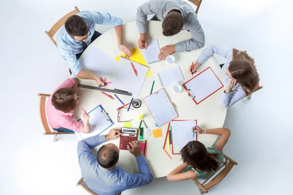 Top view of business team on workspace background — Stock Photo, Image