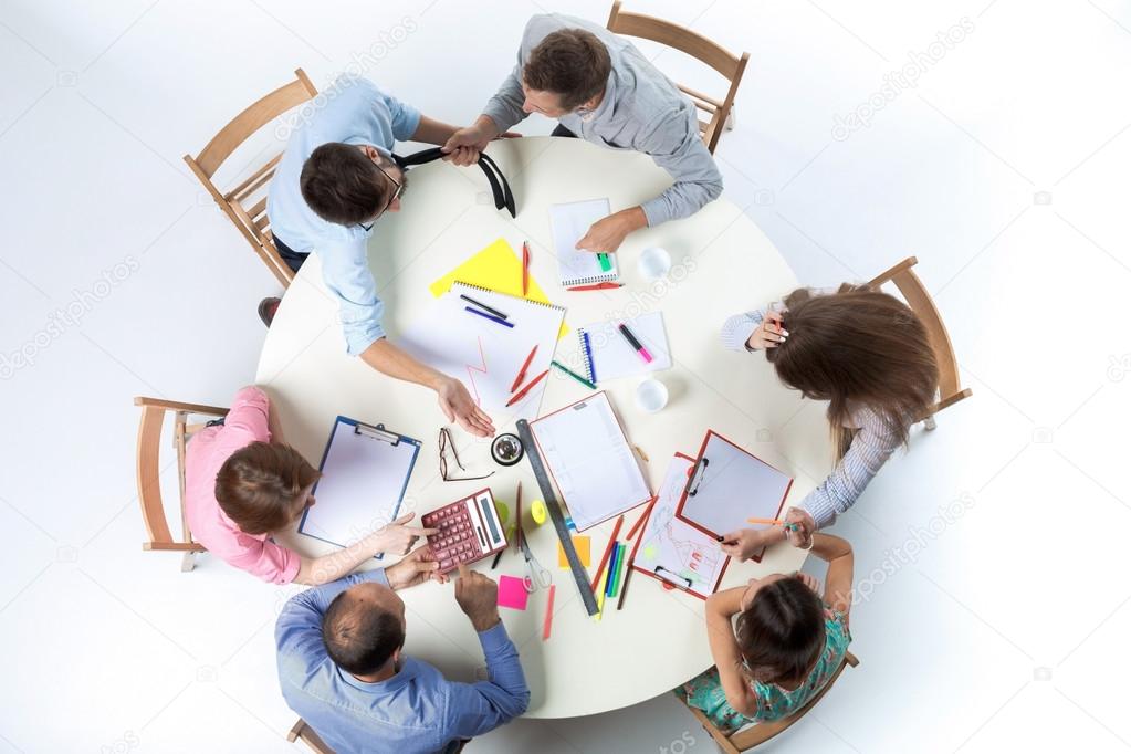 Top view of business team on workspace background 