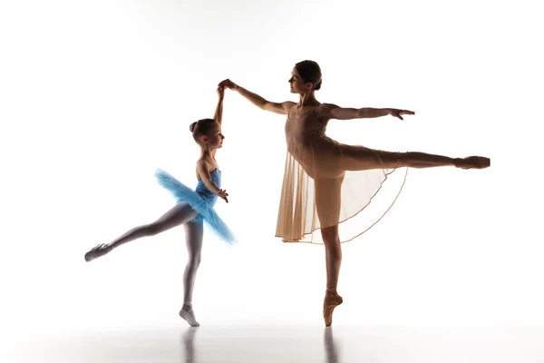 The little ballerina dancing with personal ballet teacher in dance studio — 图库照片